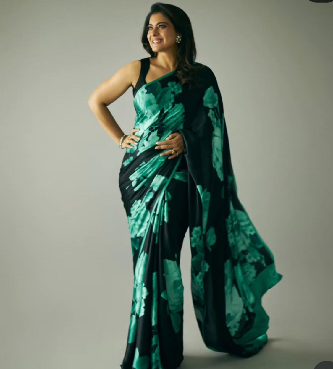 KAJOL WEAR BEAUTIFUL BLACK COLOR WITH FLOWER DESIGN SAREE