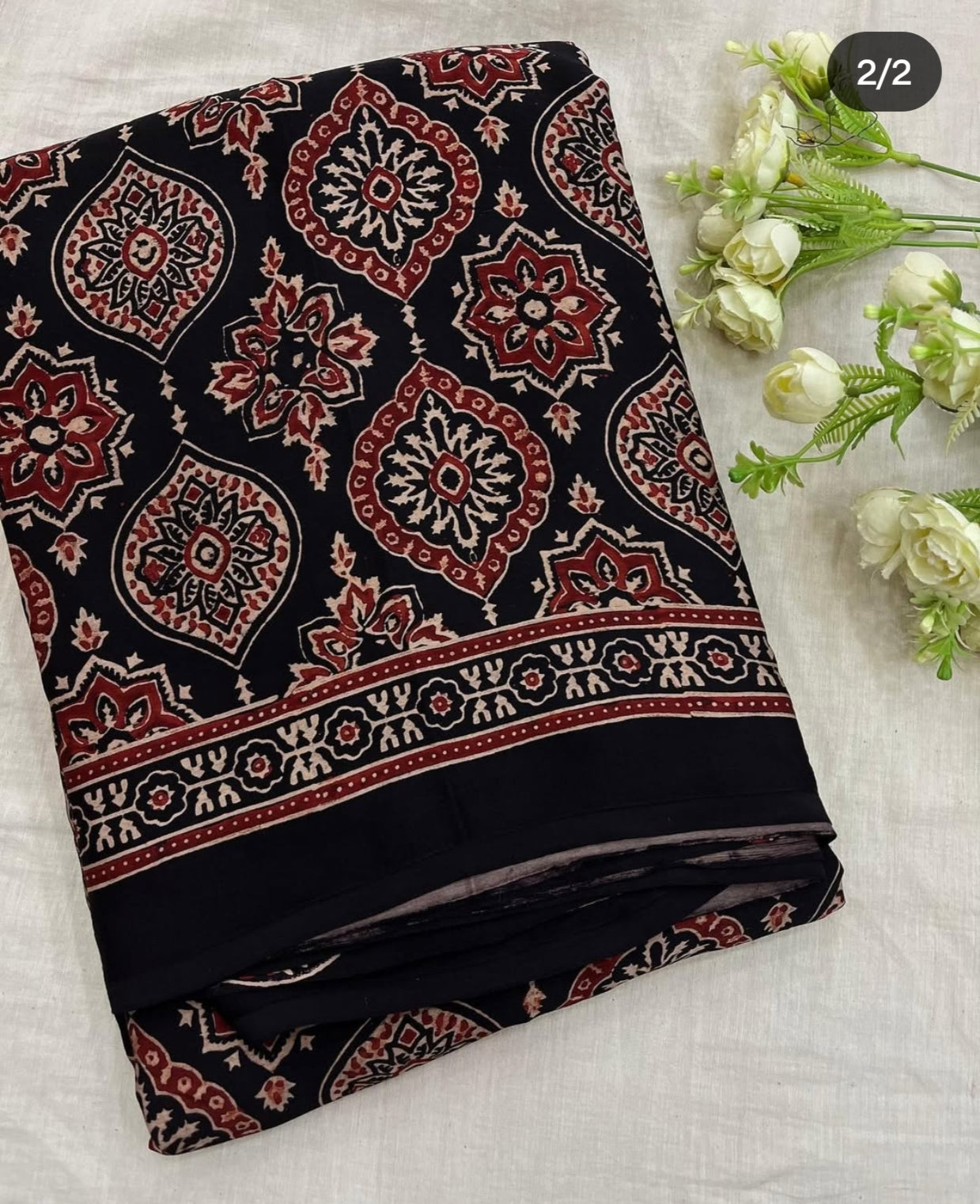 BLACK AJRAKH SAREE WITH UNSTITCHED BLOUSE PCS.