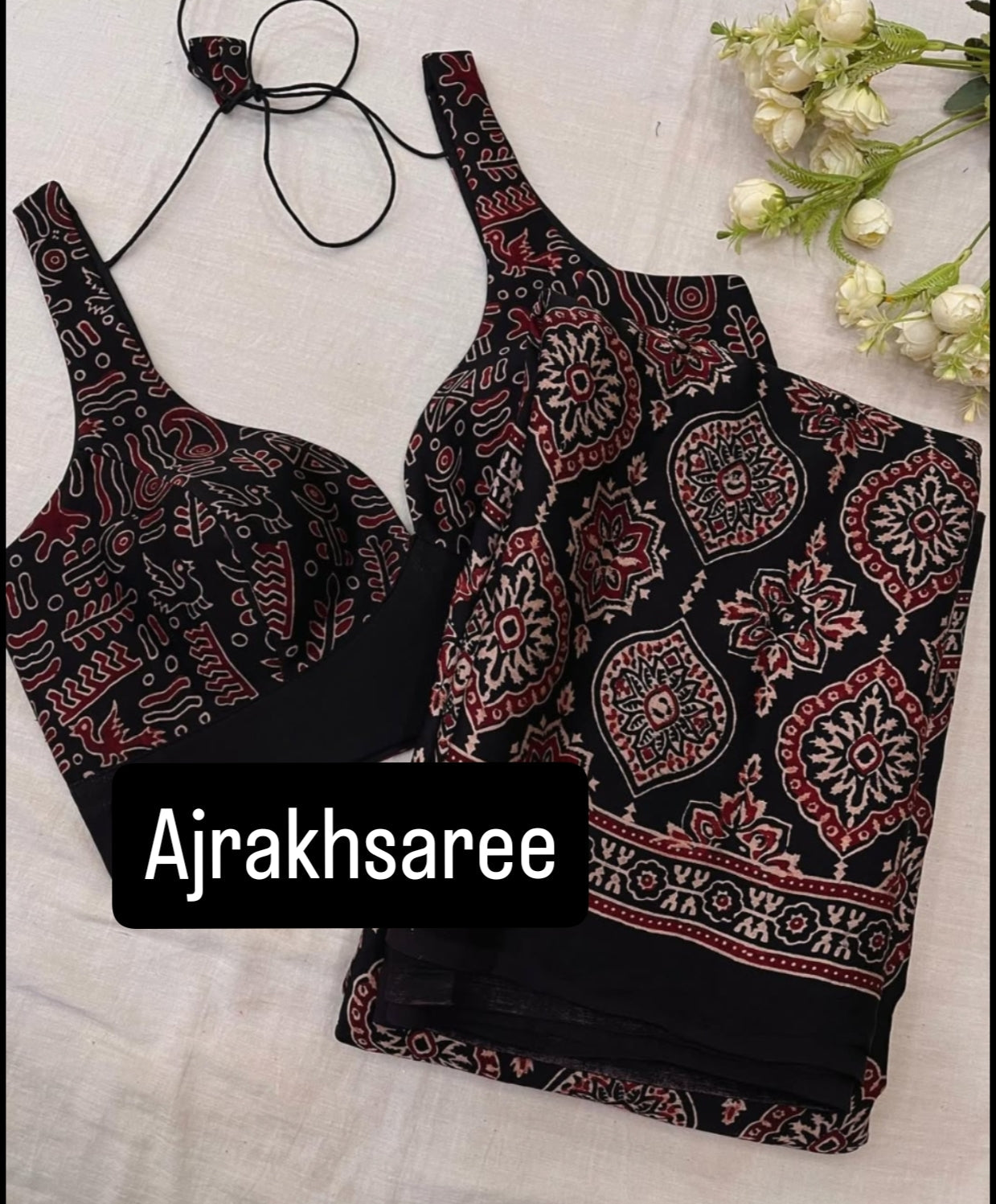 BLACK AJRAKH SAREE WITH UNSTITCHED BLOUSE PCS.