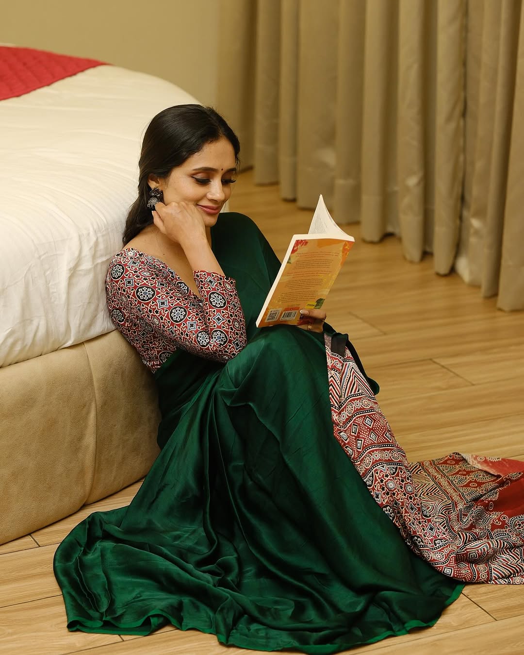 GREEN COLOR SAREE WITH RED AJRAKH PALLU