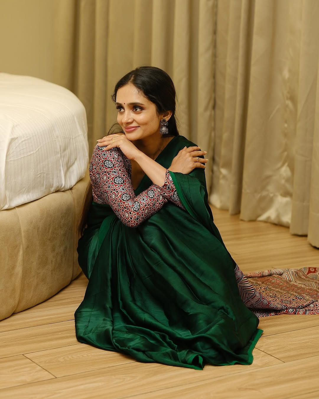 GREEN COLOR SAREE WITH RED AJRAKH PALLU