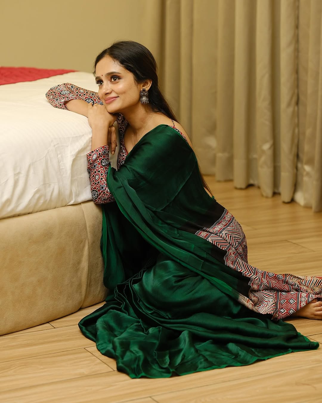 GREEN COLOR SAREE WITH RED AJRAKH PALLU