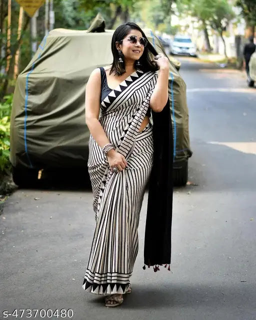 TRADITIONAL CREAM BINDI SAREE.